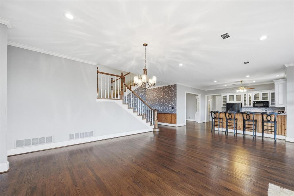 707 Cullins Road Rockwall, TX 75032 - Photo 10 of 40 a view of a room with wooden floor and breakfast area