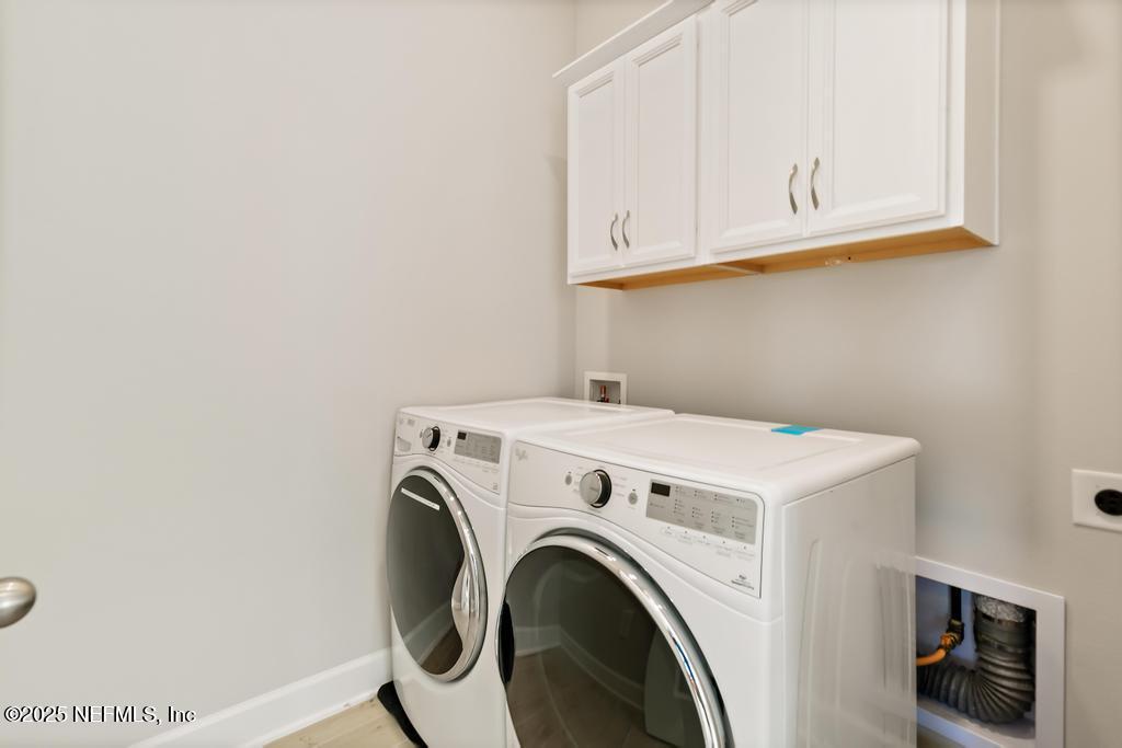 92 Alston Drive St. Augustine, FL 32092 - Photo 17 of 53 a utility room with dryer and washer