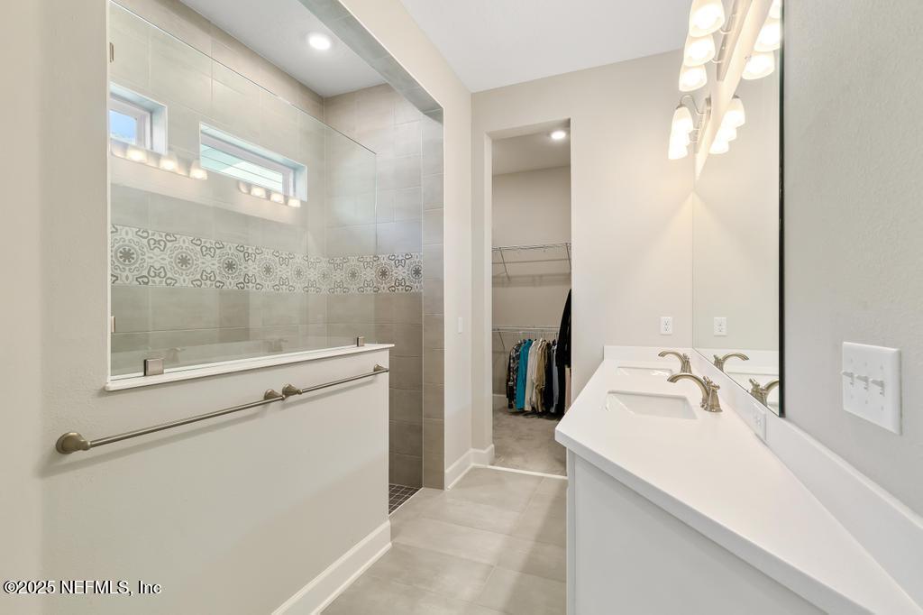 92 Alston Drive St. Augustine, FL 32092 - Photo 39 of 53 a bathroom with a sink and a mirror