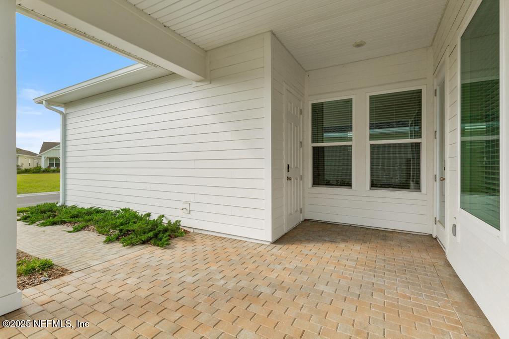 92 Alston Drive St. Augustine, FL 32092 - Photo 46 of 53 a view of a white house with a yard