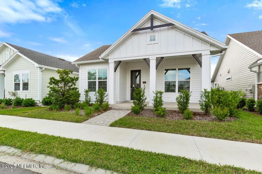 92 Alston Drive St. Augustine, FL 32092 - Photo 50 of 53 a front view of a house with a yard