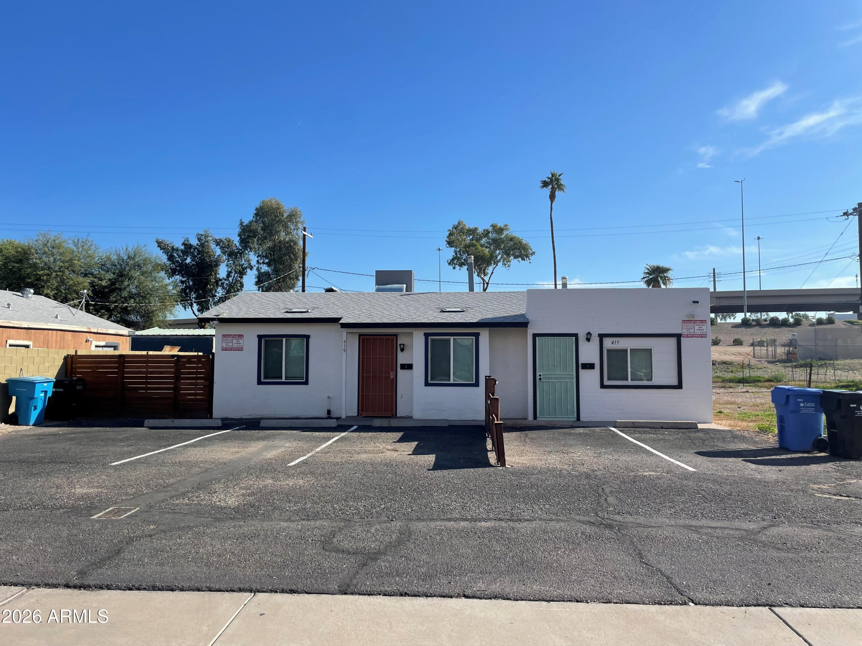 419 North 20th Street, Unit 2 Phoenix, AZ 85006 - Photo 1 of 15 a view of a house with a backyard