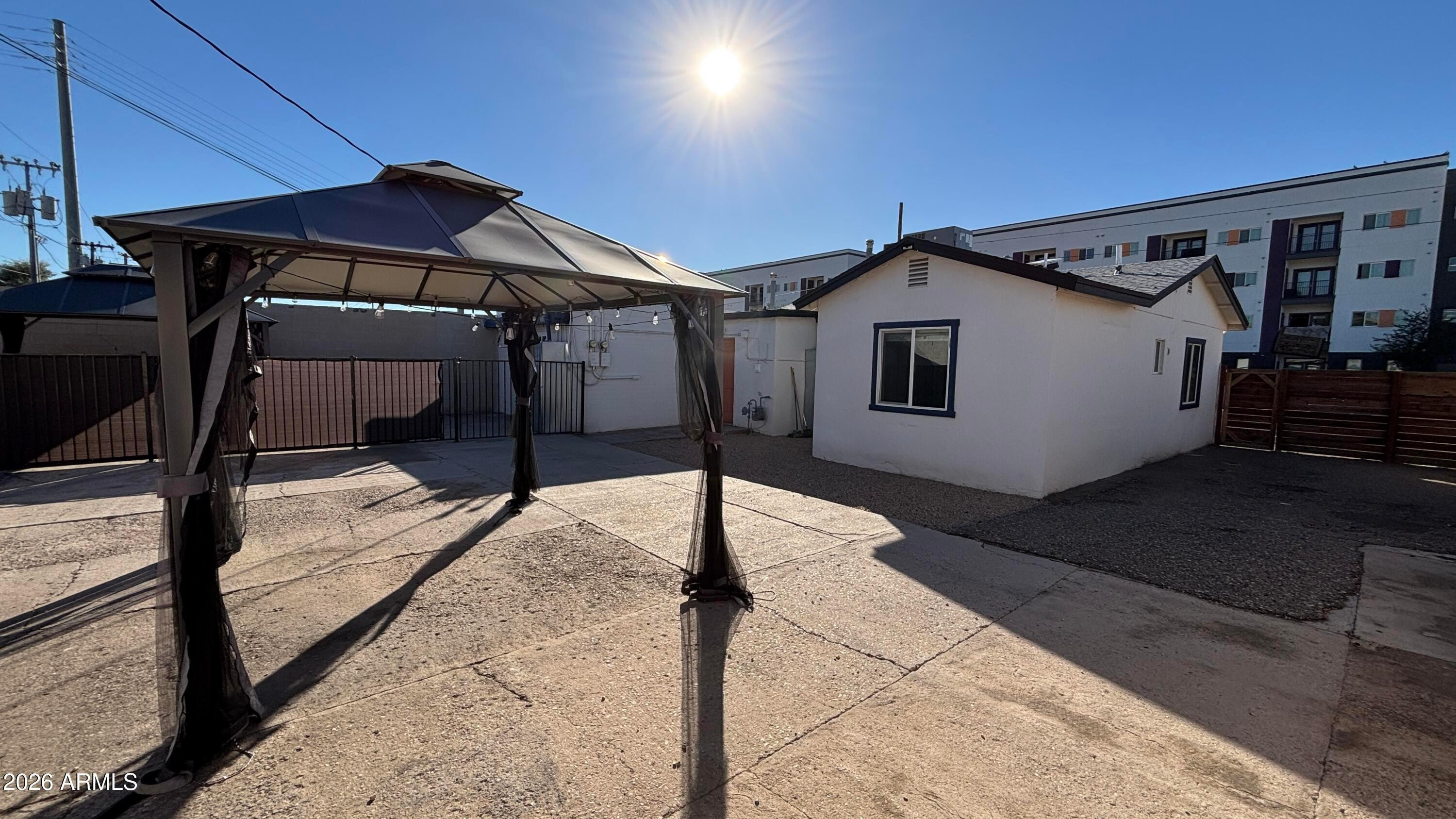 419 North 20th Street, Unit 2 Phoenix, AZ 85006 - Photo 15 of 15 a house with trees in the background