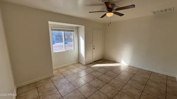 a view of an empty room and window