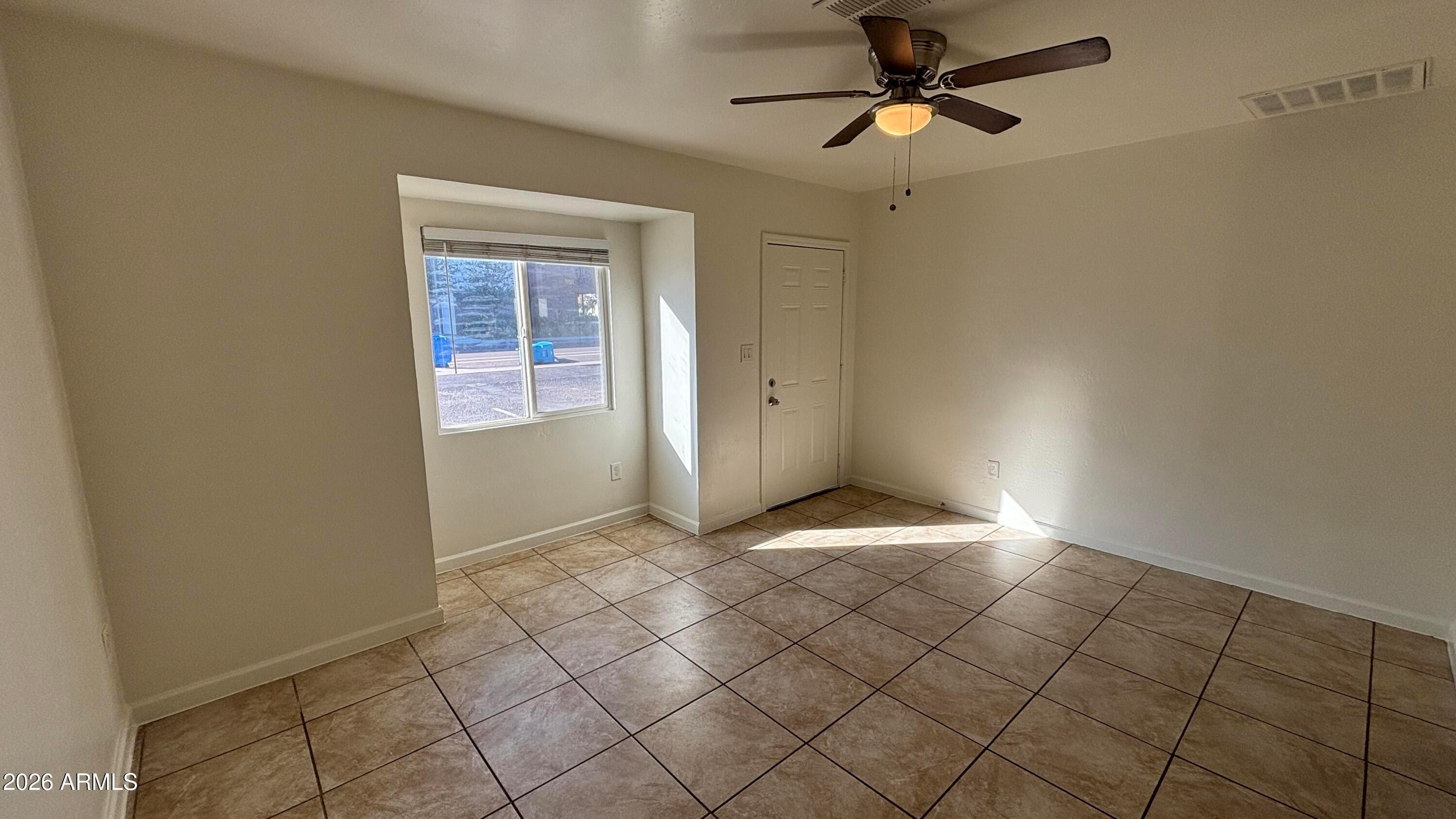 419 North 20th Street, Unit 2 Phoenix, AZ 85006 - Photo 4 of 15 a view of an empty room and window