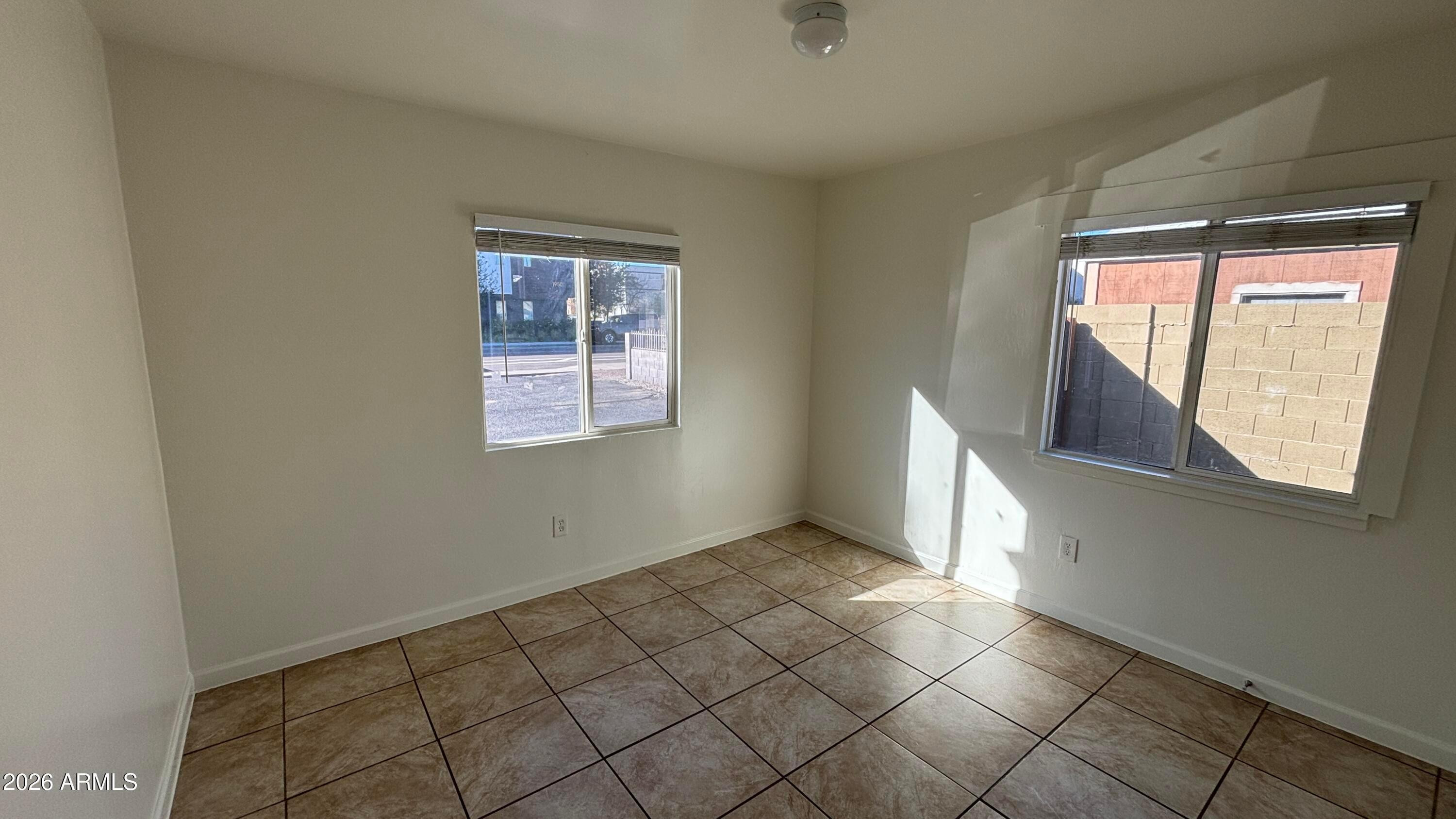 419 North 20th Street, Unit 2 Phoenix, AZ 85006 - Photo 8 of 15 a view of an empty room and window