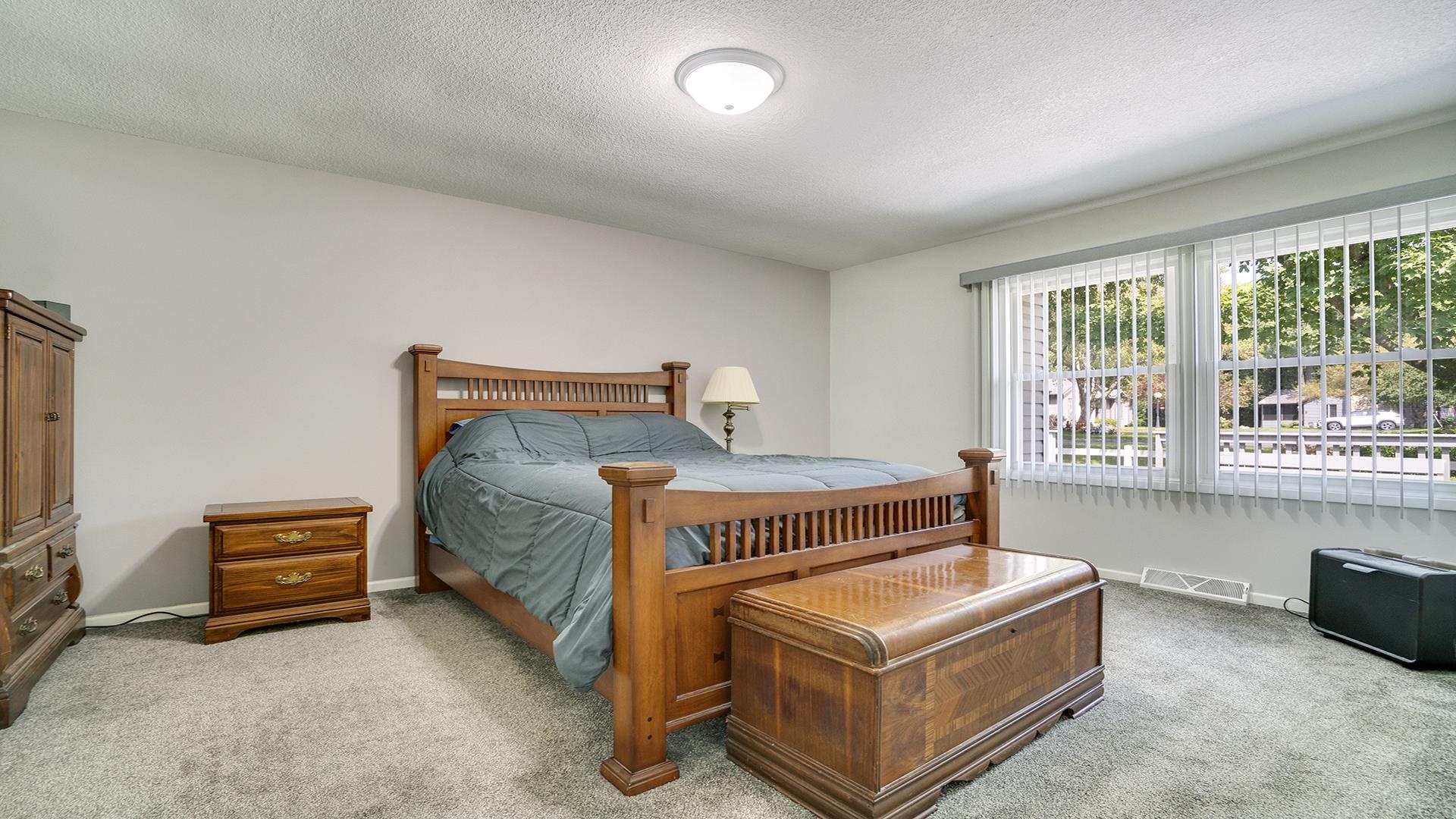 1065 Idle Oak Run Dixon, IL 61021 - Photo 13 of 44 a bedroom with bed and a large window