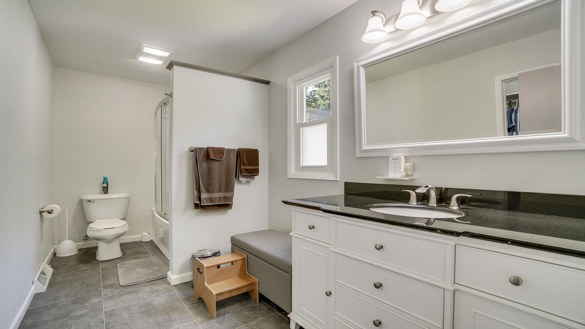 1065 Idle Oak Run Dixon, IL 61021 - Photo 15 of 44 a bathroom with a sink a toilet and mirror