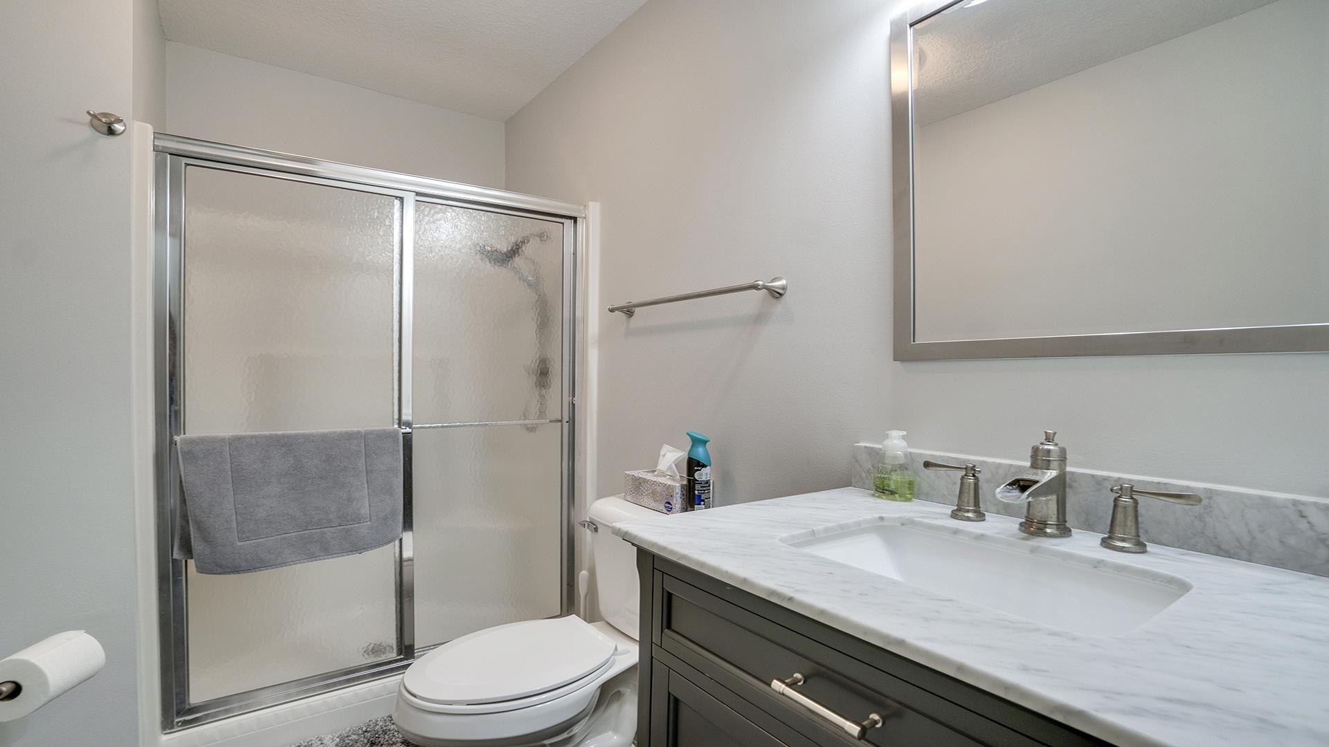 1065 Idle Oak Run Dixon, IL 61021 - Photo 19 of 44 a bathroom with a granite countertop sink toilet and shower