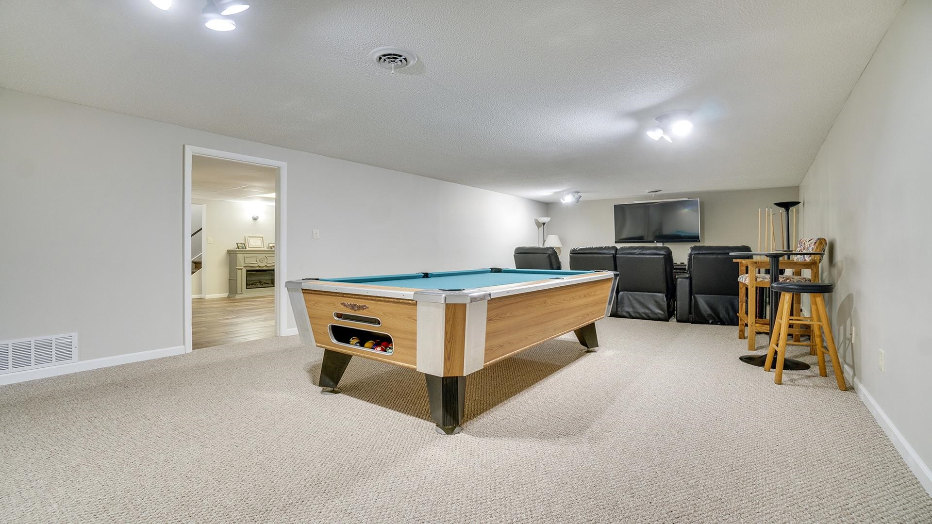 1065 Idle Oak Run Dixon, IL 61021 - Photo 26 of 44 a kitchen with stainless steel appliances kitchen island granite countertop a refrigerator and a stove