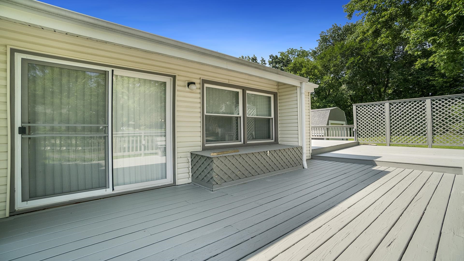1065 Idle Oak Run Dixon, IL 61021 - Photo 36 of 44 a view of a deck with wooden floor and fence