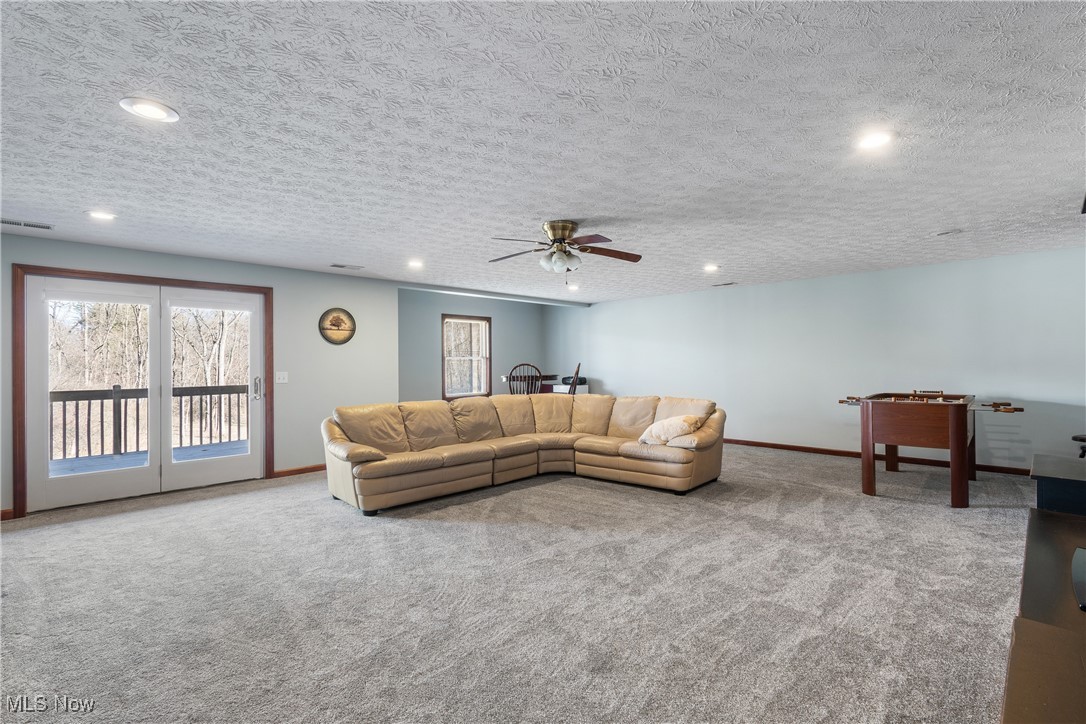 3393 Friendsville Road Wooster, OH 44691 - Photo 24 of 34 Carpeted living area featuring recessed lighting, visible vents, and baseboards