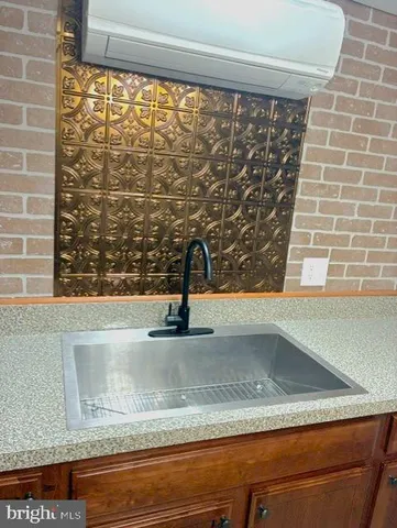 a close view of sink and mirror