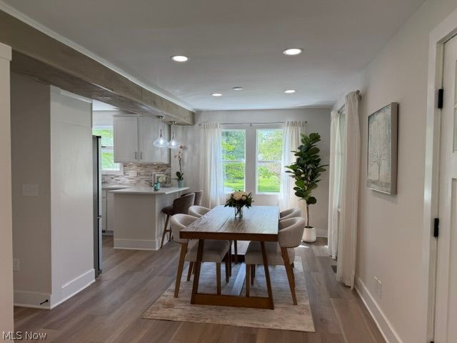 5366 Barton Road North Ridgeville, OH 44039 - Photo 16 of 49 Open concept dining room with natural sunlight and recessed lighting.