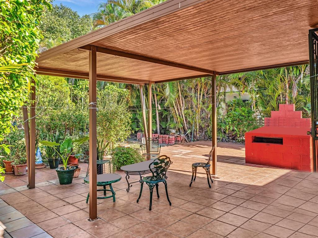 2347 Southwest 18th Street Miami, FL 33145 - Photo 29 of 46 a patio with table and chairs