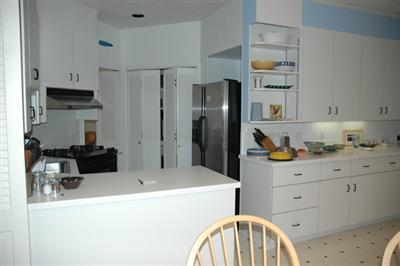 40 Mashnee Road Bourne, MA 02532 - Photo 2 of 12 a kitchen with stainless steel appliances a refrigerator sink and cabinets