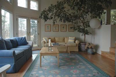 40 Mashnee Road Bourne, MA 02532 - Photo 4 of 12 a living room with furniture and a large window