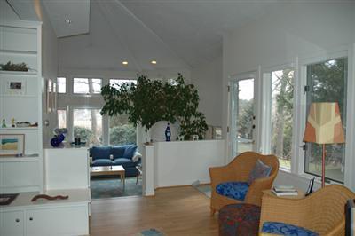 40 Mashnee Road Bourne, MA 02532 - Photo 5 of 12 a living room with furniture and a potted plant