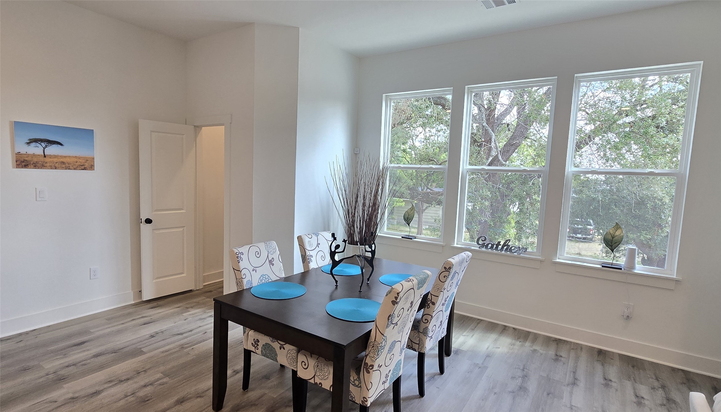 4922 Hoover Street, Unit F Houston, TX 77092 - Photo 8 of 26 Enjoy dining in this room which overlooks a wide open space with mature oak trees.