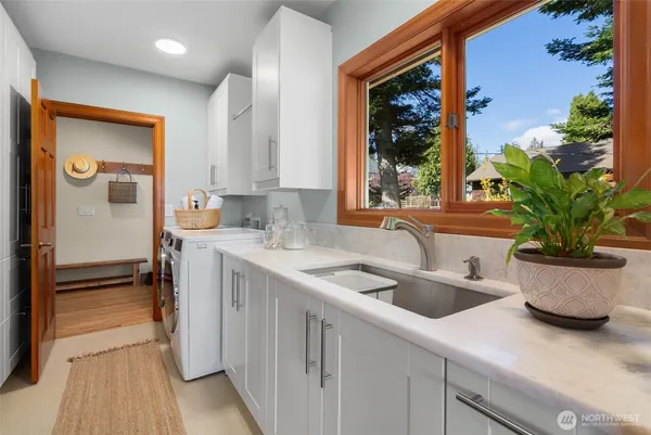 a kitchen with a sink and a window