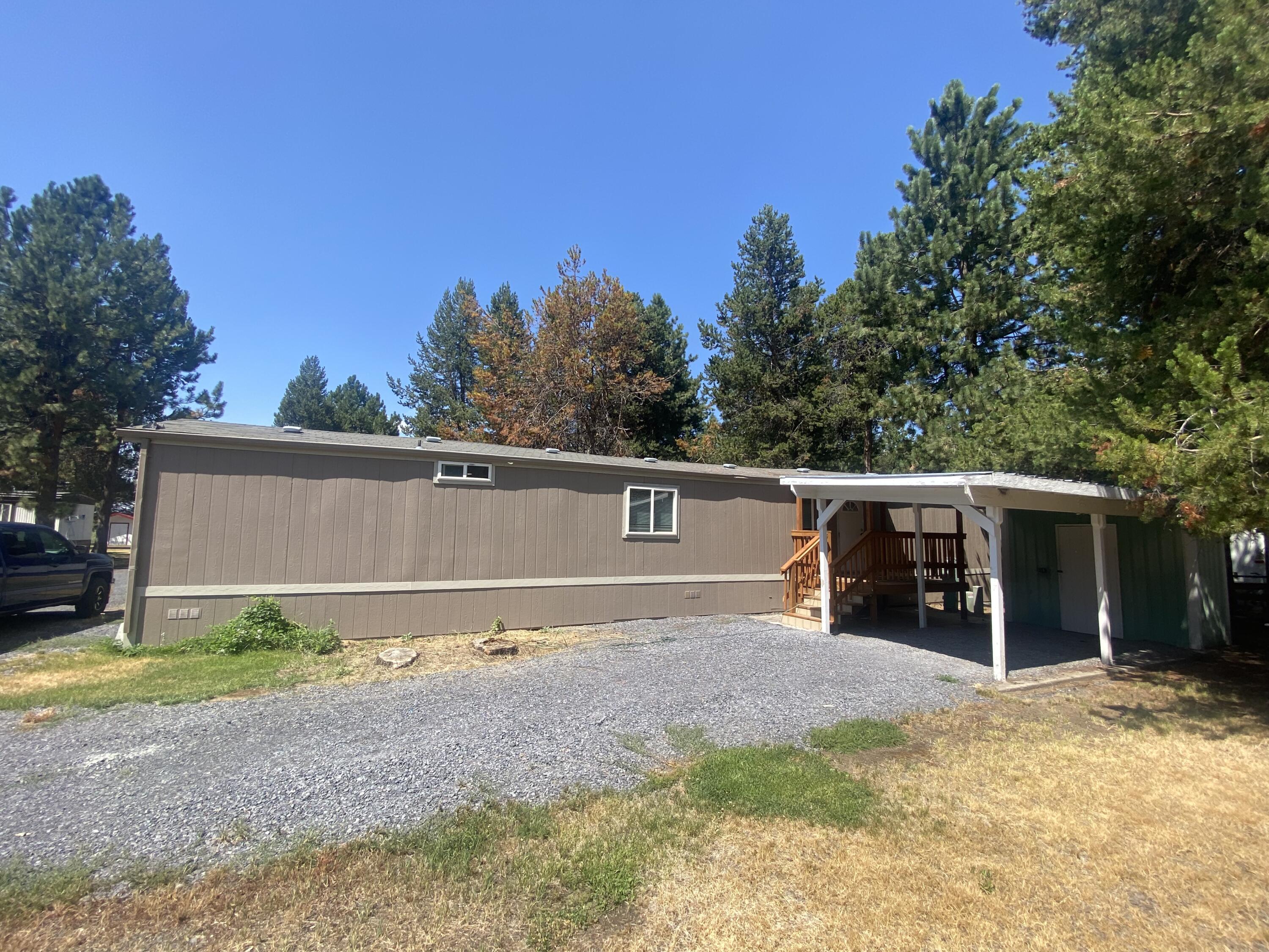 52731 Huntington Road La Pine, OR 97739 - Photo 3 of 26 Driveway.Carport & Entry