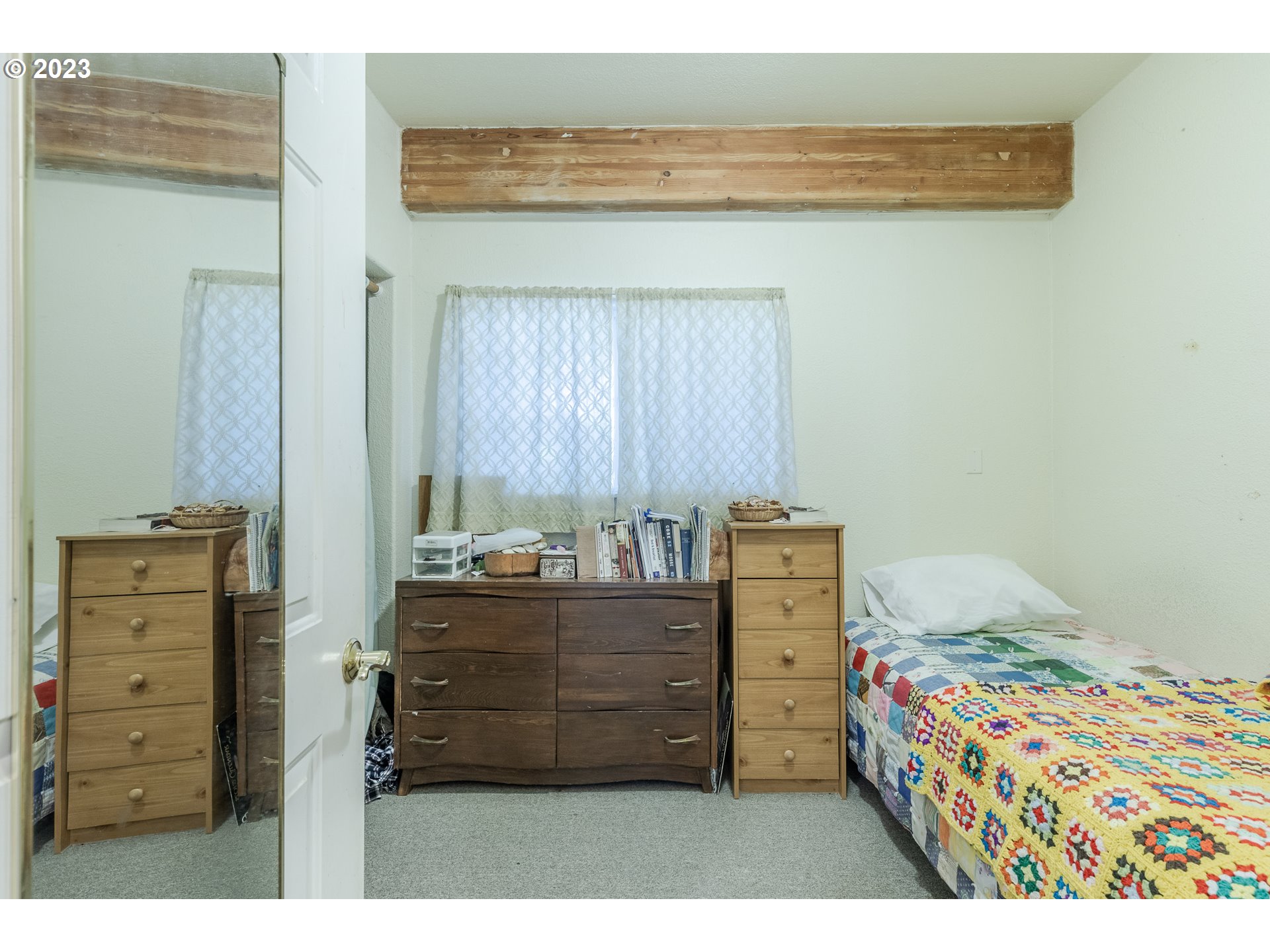 6585 Main Street Springfield, OR 97478 - Photo 24 of 30 a bedroom with a bed and a dresser