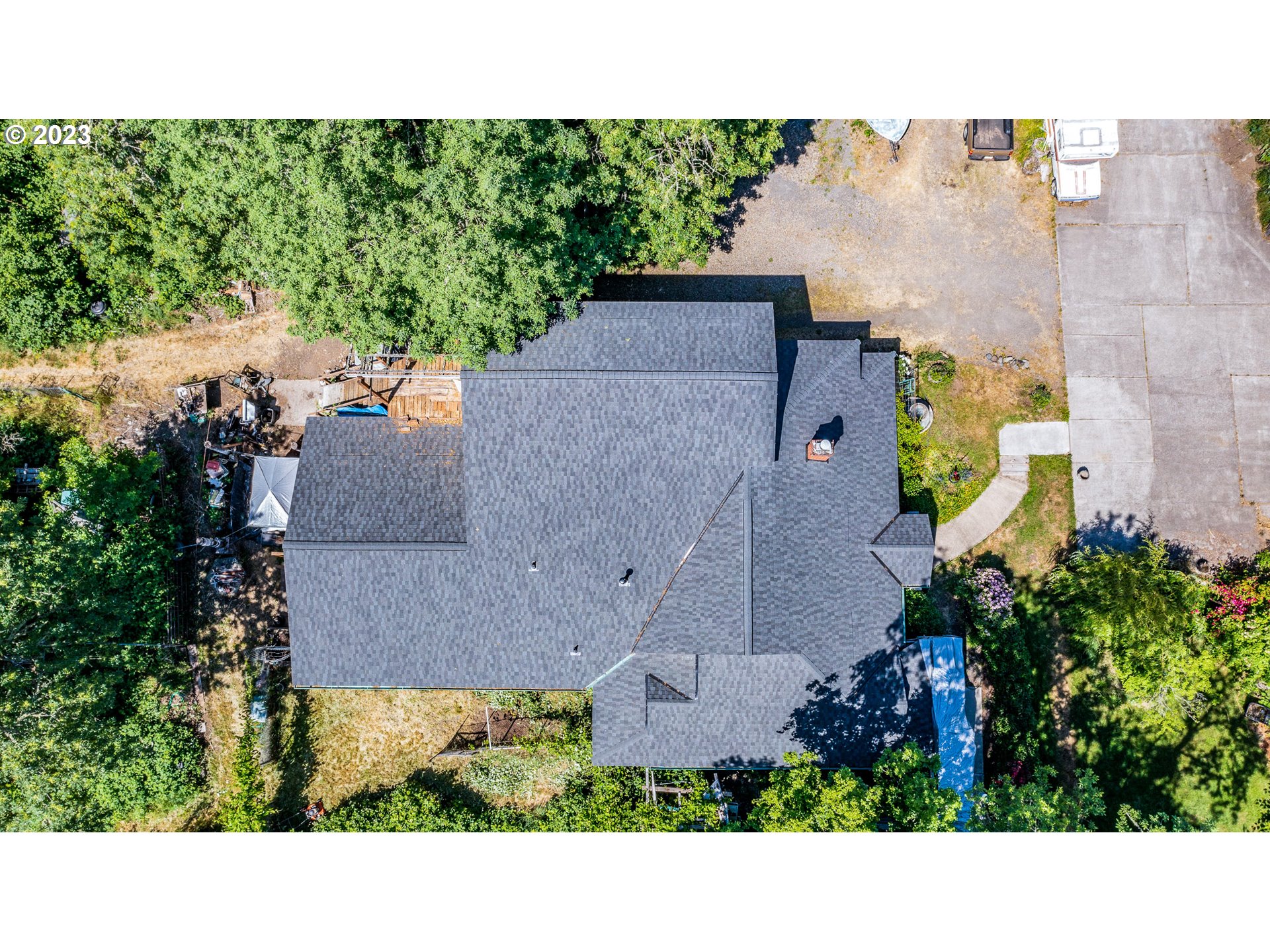 6585 Main Street Springfield, OR 97478 - Photo 29 of 30 an aerial view of a house with a yard and garden