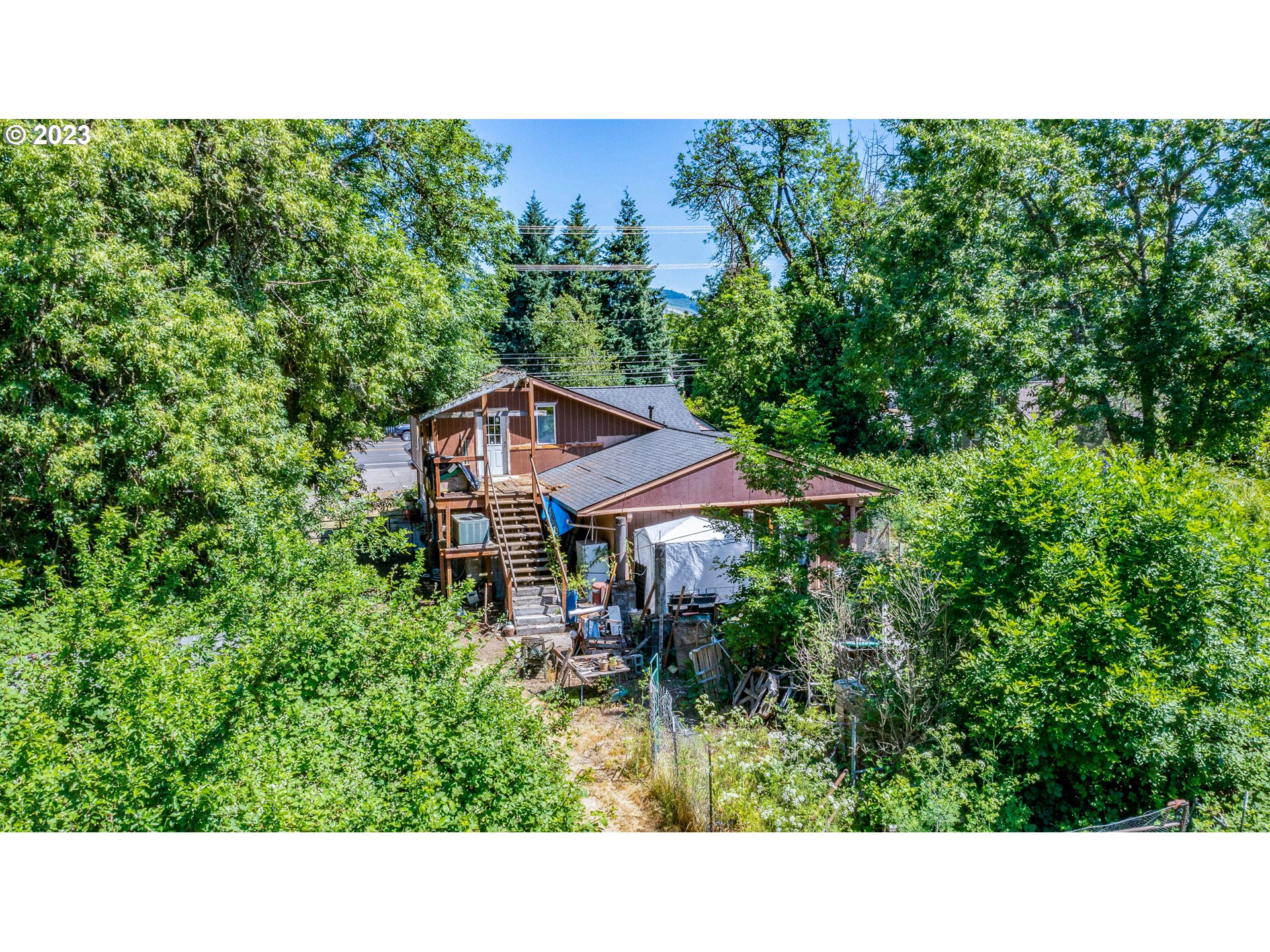 6585 Main Street Springfield, OR 97478 - Photo 5 of 30 a black and white photo of a house