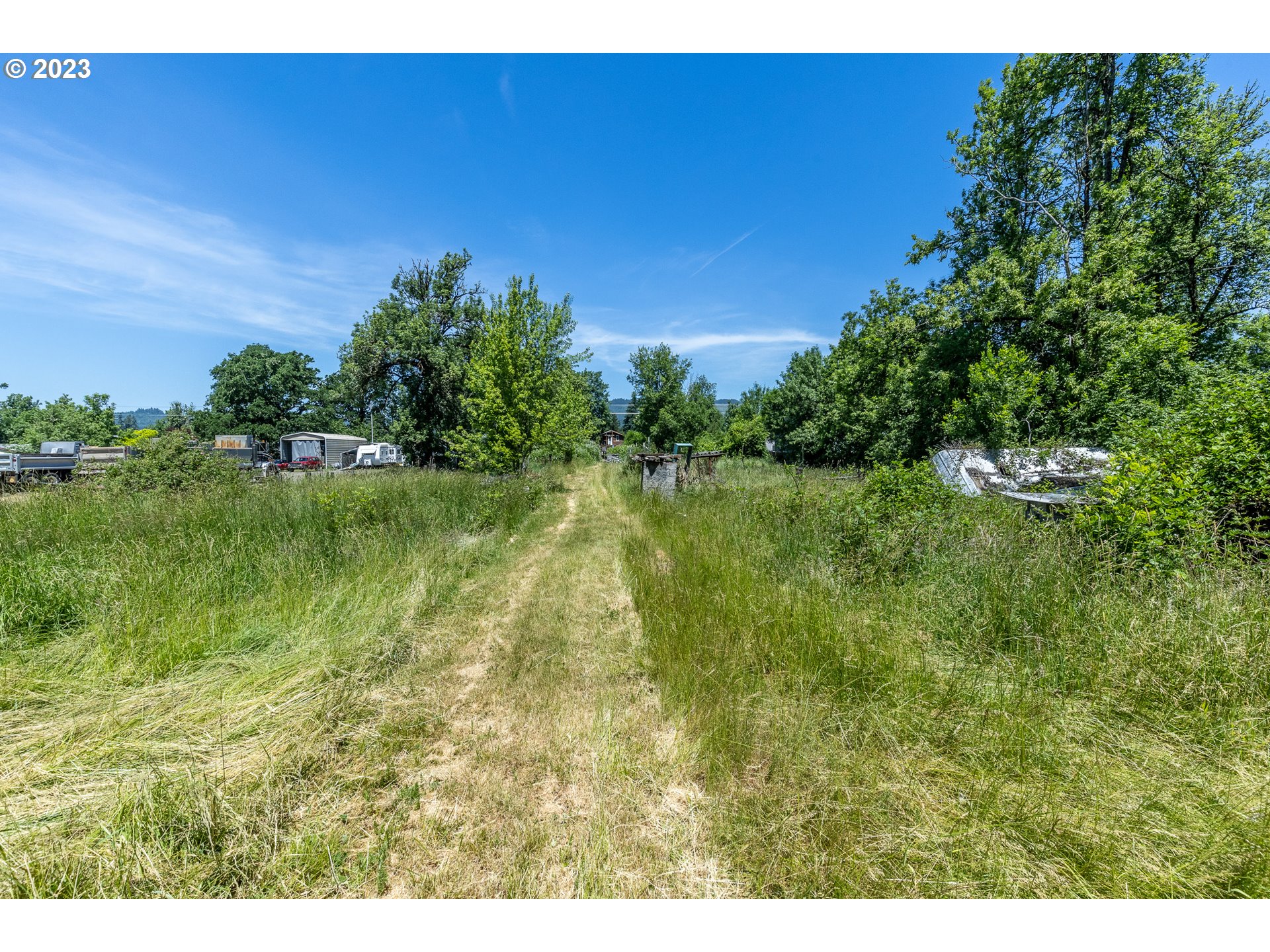 6585 Main Street Springfield, OR 97478 - Photo 7 of 30 a view of a lake with a yard