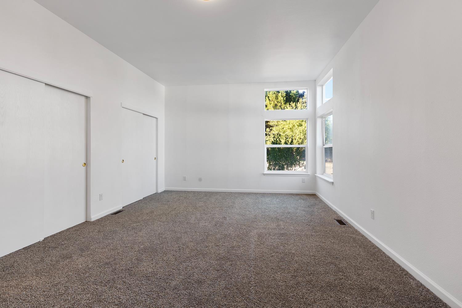 8181 West Kile Road Thornton, CA 95686 - Photo 25 of 65 an empty room with windows
