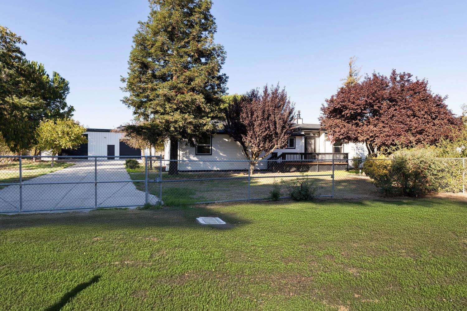 8181 West Kile Road Thornton, CA 95686 - Photo 53 of 65 a swimming pool with outdoor seating and yard