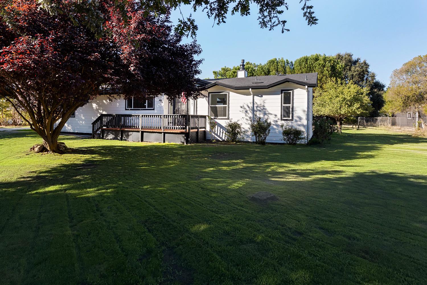 8181 West Kile Road Thornton, CA 95686 - Photo 55 of 65 a view of a house with a big yard