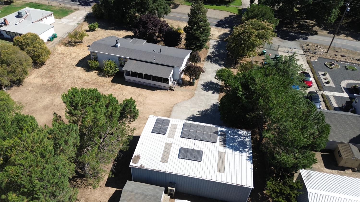 8181 West Kile Road Thornton, CA 95686 - Photo 57 of 65 an aerial view of residential house with outdoor space and trees all around