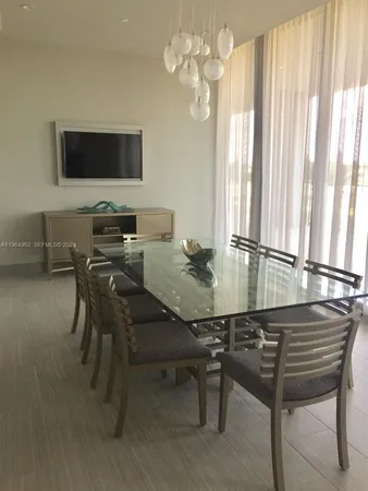 a view of an empty room with a large window