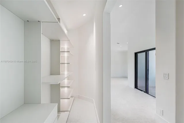 a view of a room with a large window