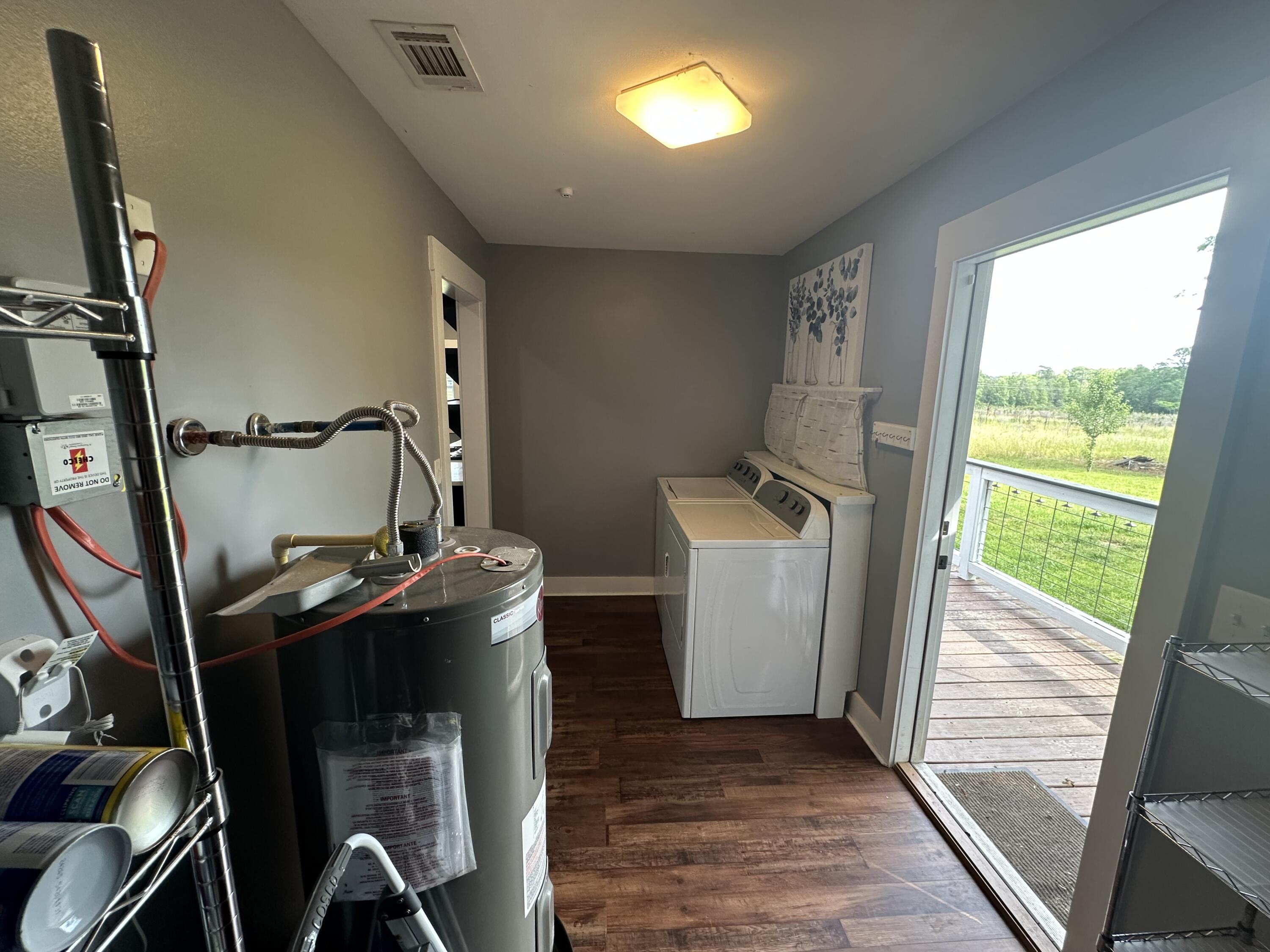 10712 Highway 331 DeFuniak Springs, FL 32433 - Photo 17 of 56 a view of a room with washer and dryer