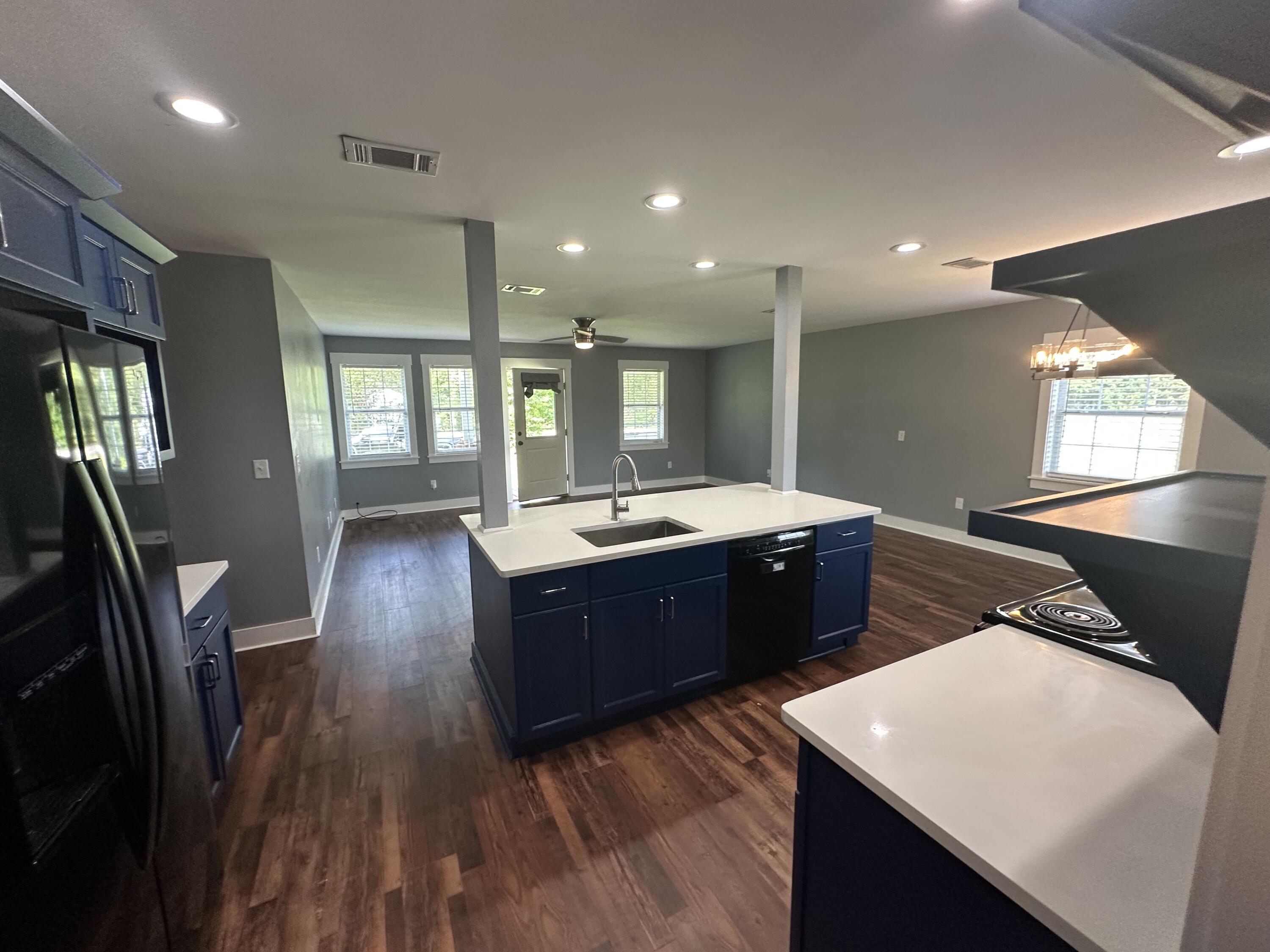 10712 Highway 331 DeFuniak Springs, FL 32433 - Photo 22 of 56 a bathroom with a sink double vanity granite and a large mirror