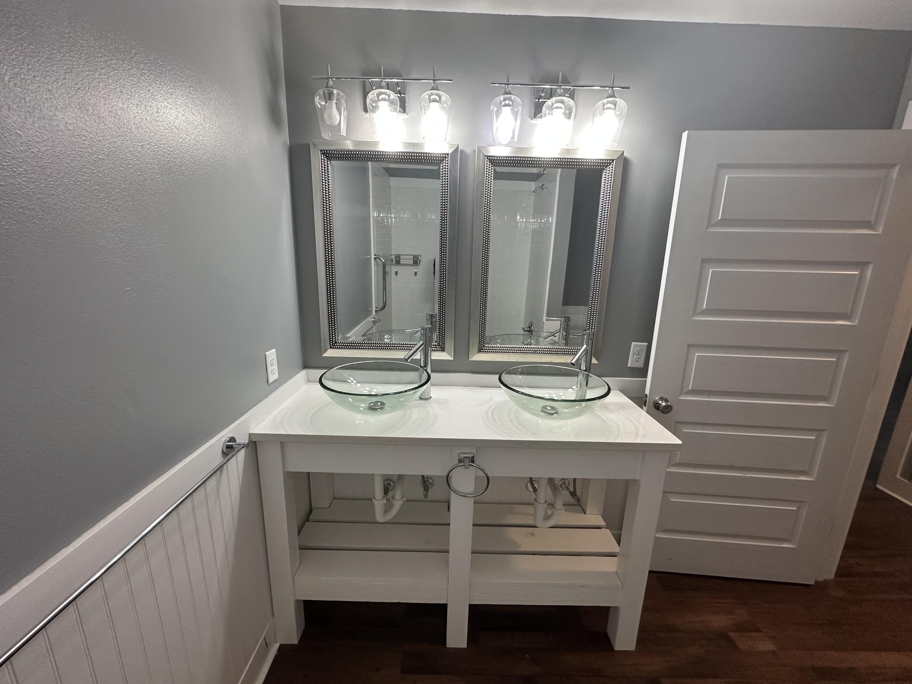 10712 Highway 331 DeFuniak Springs, FL 32433 - Photo 27 of 56 a bathroom with a sink and a mirror