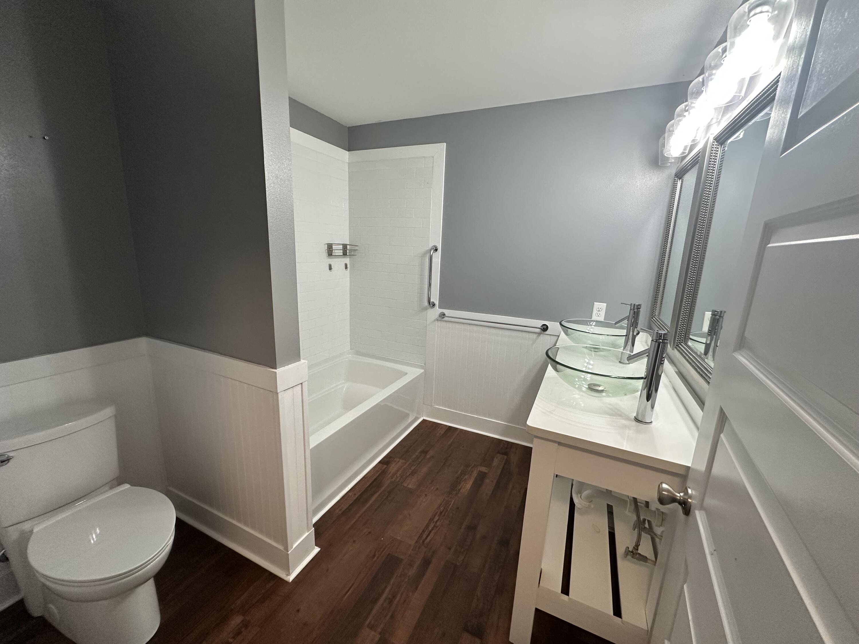 10712 Highway 331 DeFuniak Springs, FL 32433 - Photo 29 of 56 a bathroom with a sink and a toilet