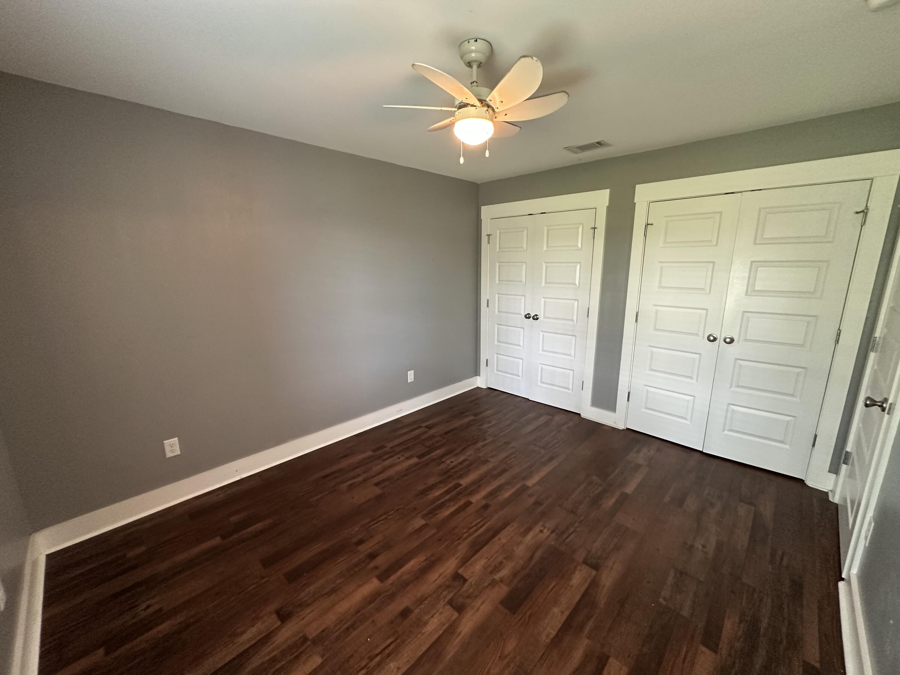 10712 Highway 331 DeFuniak Springs, FL 32433 - Photo 33 of 56 wooden floor in an empty room