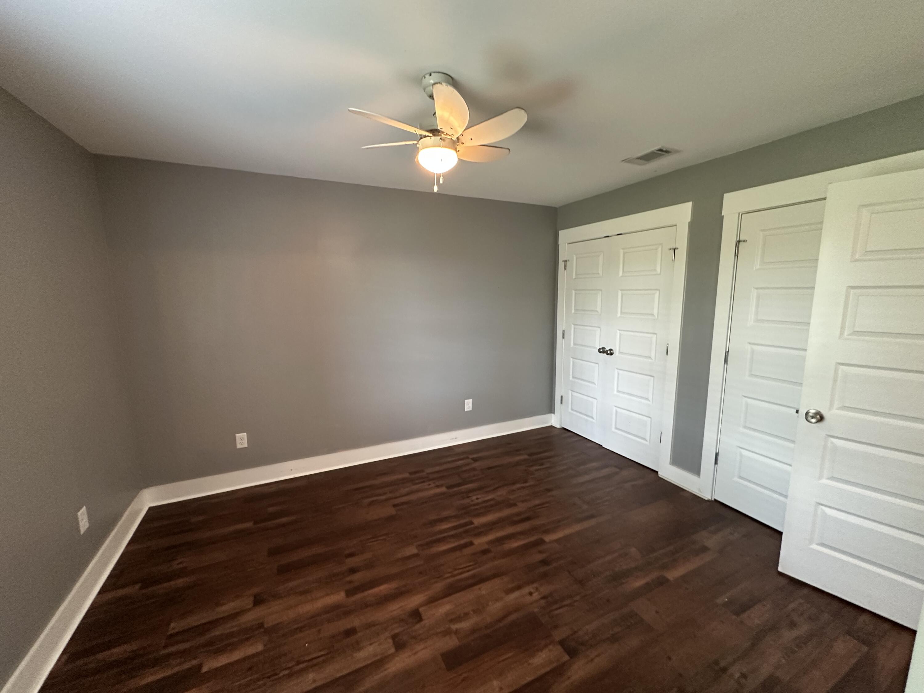 10712 Highway 331 DeFuniak Springs, FL 32433 - Photo 34 of 56 wooden floor in an empty room