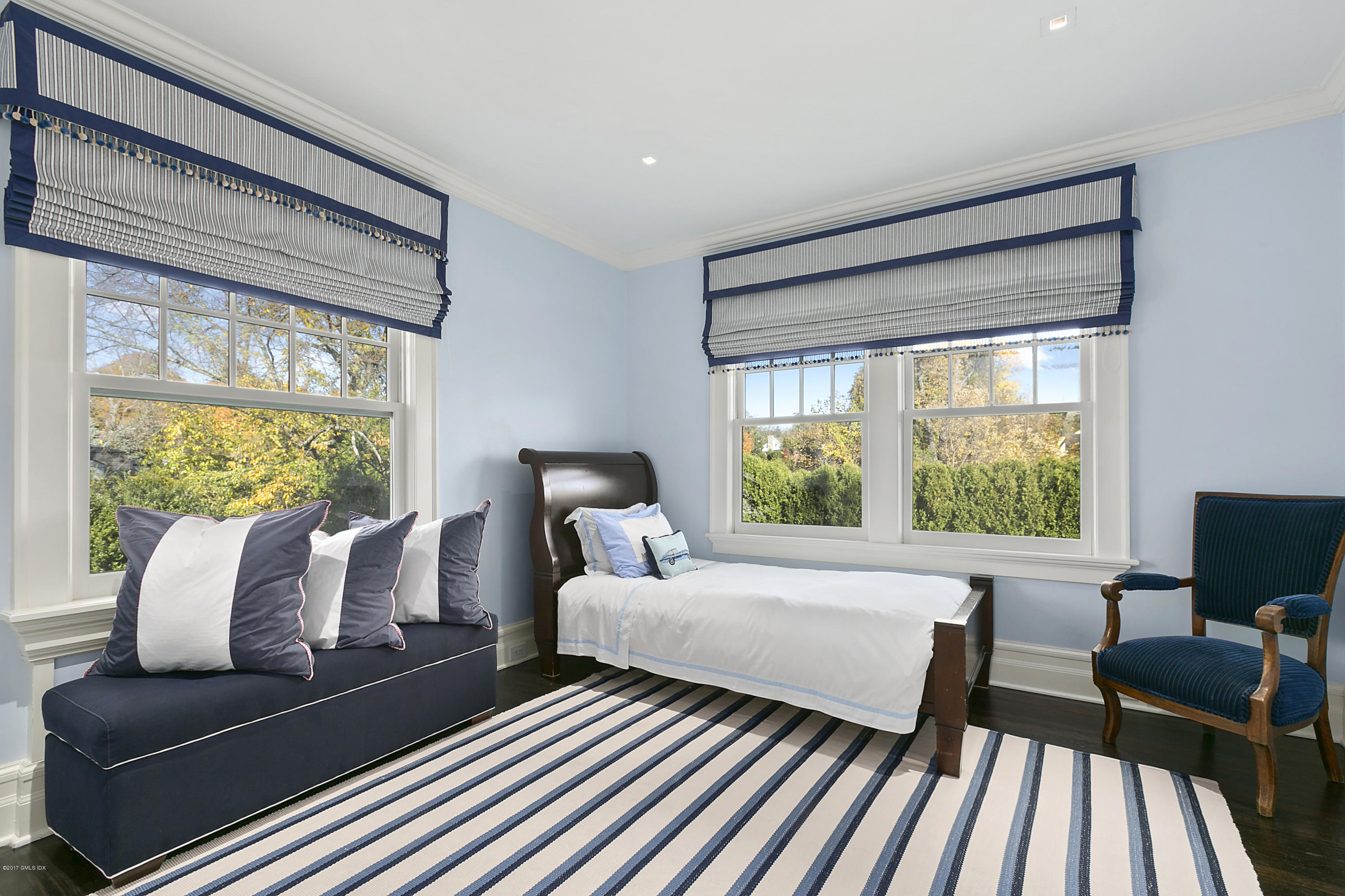 133 Otter Rock Drive Greenwich, CT 06830 - Photo 12 of 17 a living room with furniture and a large window