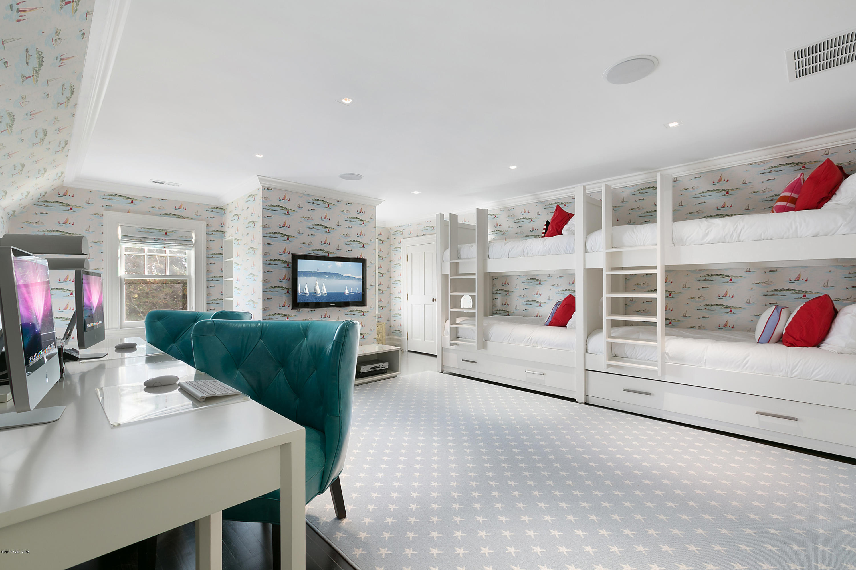 133 Otter Rock Drive Greenwich, CT 06830 - Photo 15 of 17 a living room with furniture and a flat screen tv