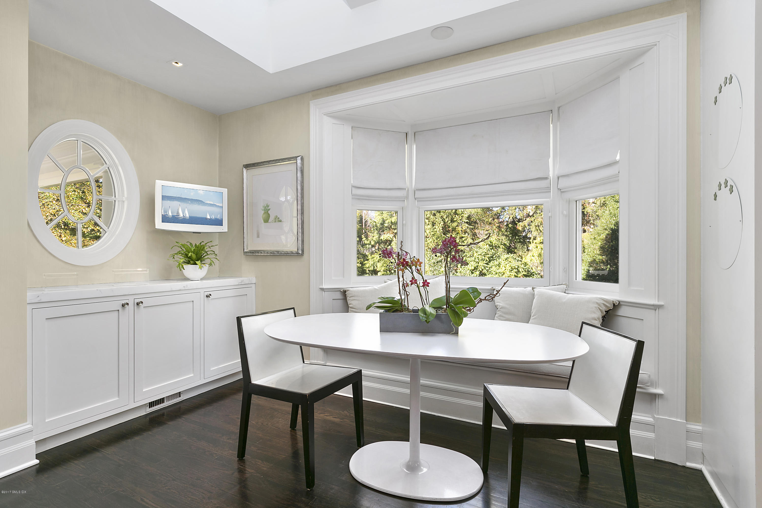 133 Otter Rock Drive Greenwich, CT 06830 - Photo 10 of 17 a view of a dining room with furniture and window