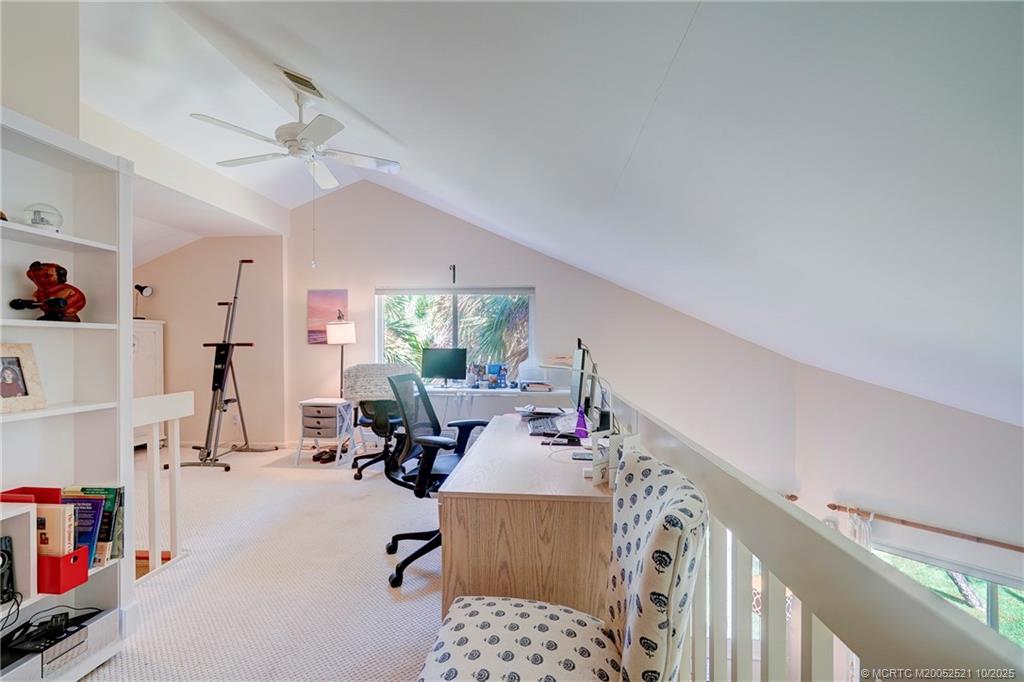 233 Northeast Edgewater Drive, Unit 201 Stuart, FL 34996 - Photo 43 of 64 a very nice looking room with a big bed