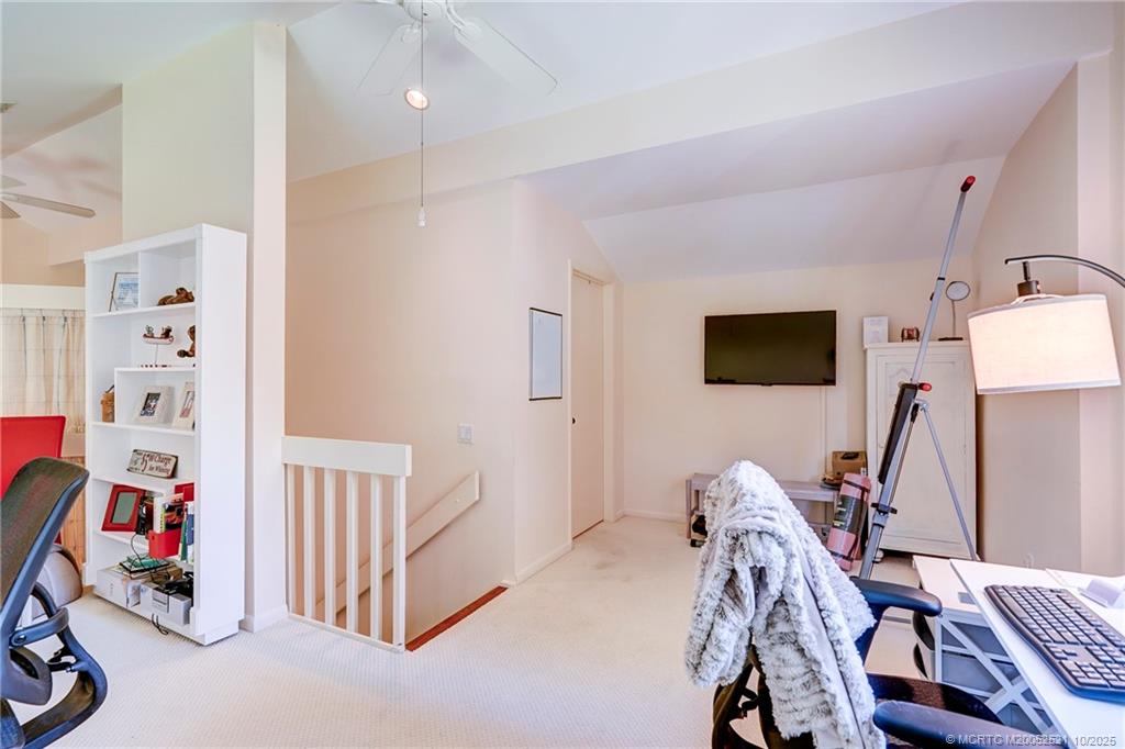 233 Northeast Edgewater Drive, Unit 201 Stuart, FL 34996 - Photo 45 of 64 a view of a room with gym equipment