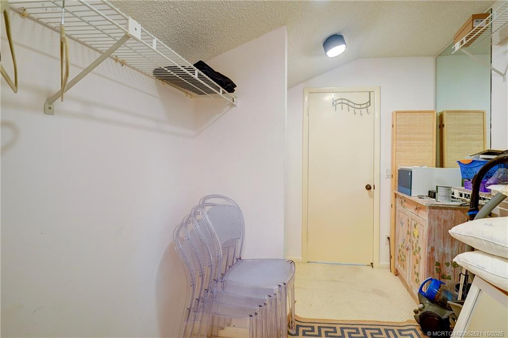 233 Northeast Edgewater Drive, Unit 201 Stuart, FL 34996 - Photo 49 of 64 a view of hallway that has closet