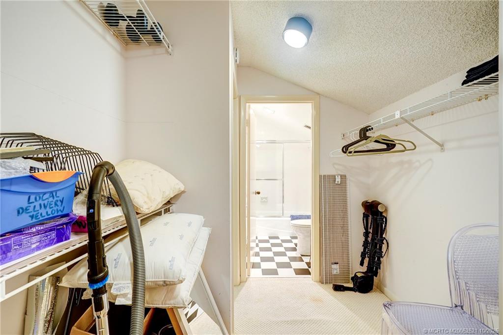 233 Northeast Edgewater Drive, Unit 201 Stuart, FL 34996 - Photo 50 of 64 a view of a hallway with seating area