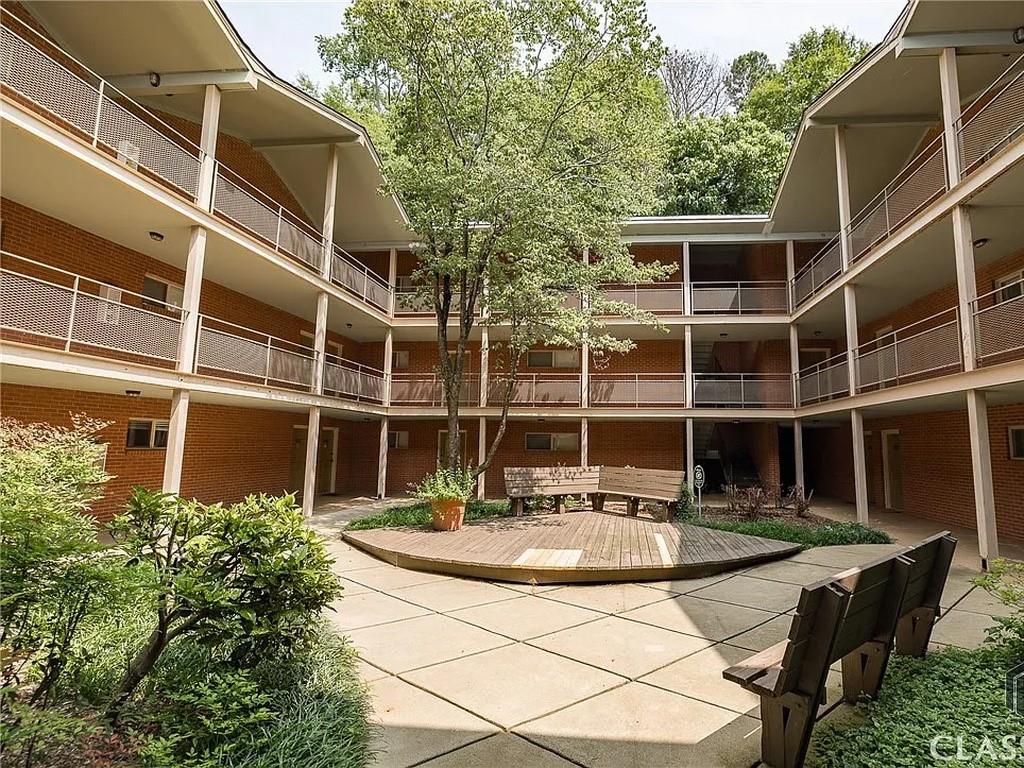 250 Little Street, Unit D107 Athens, GA 30605 - Photo 1 of 20 a view of a house with backyard and sitting area