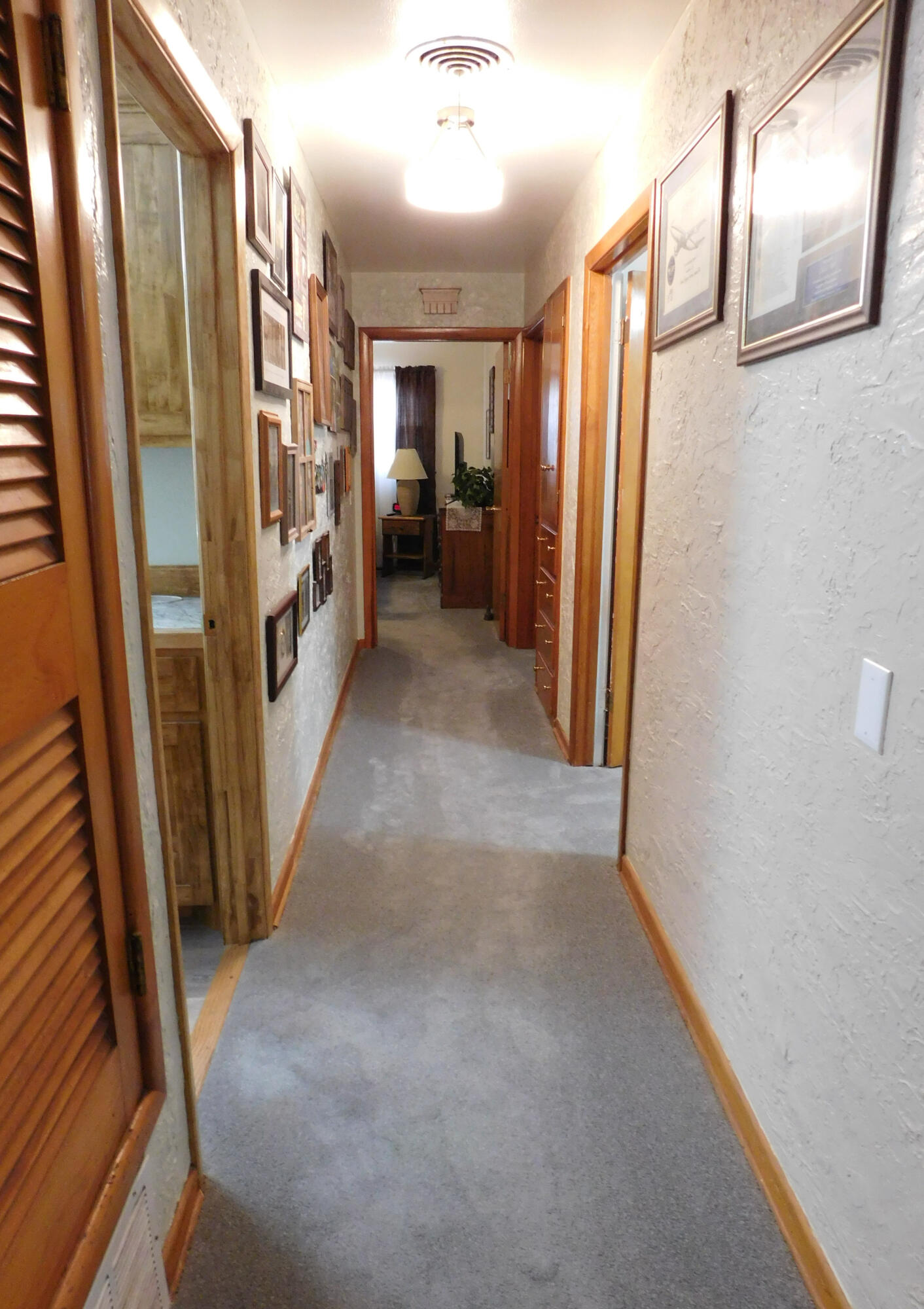 122 West 16th Street Muleshoe, TX 79347 - Photo 7 of 27 a view of hallway with stairs